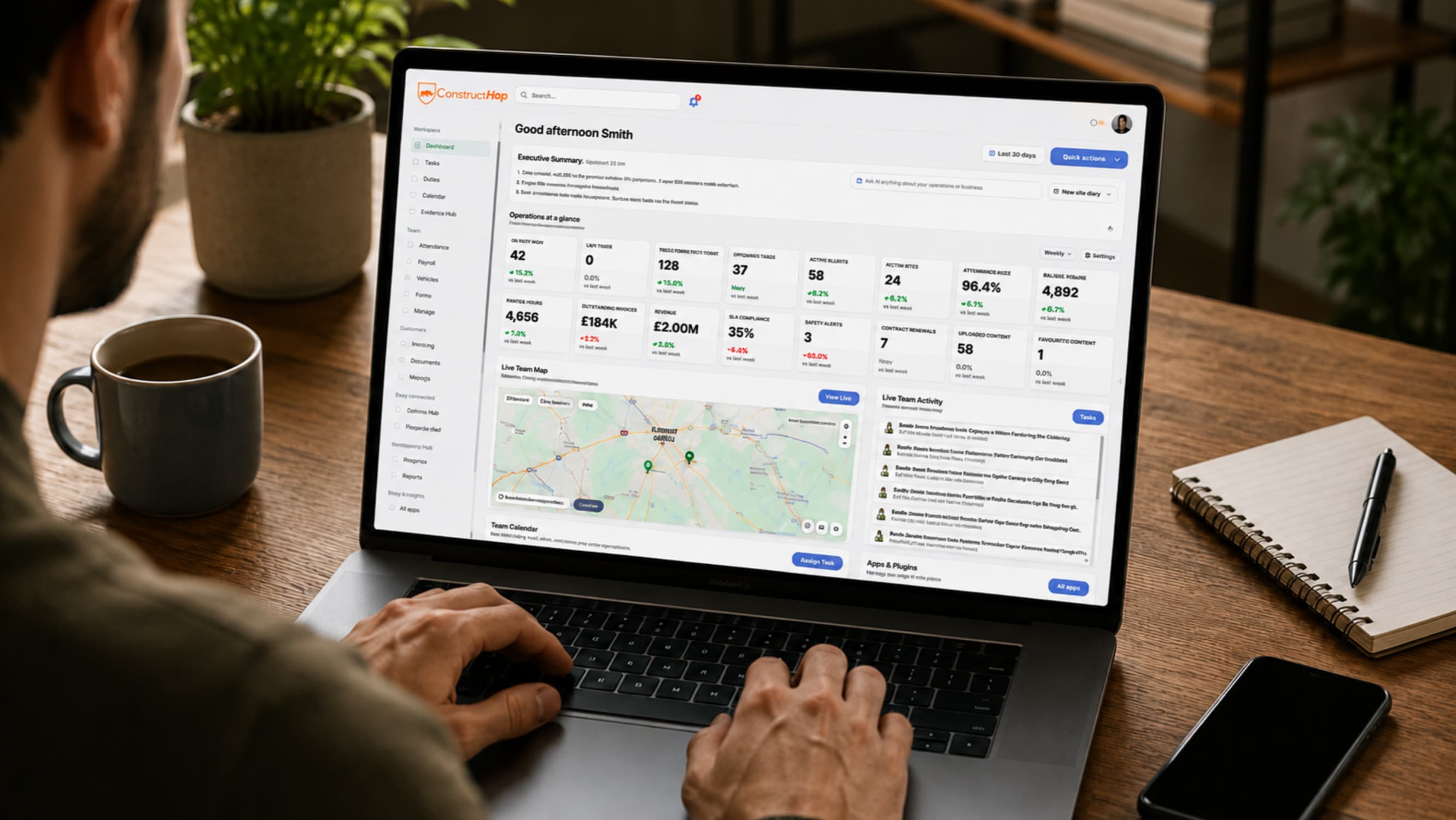 ConstructHop dashboard on a laptop